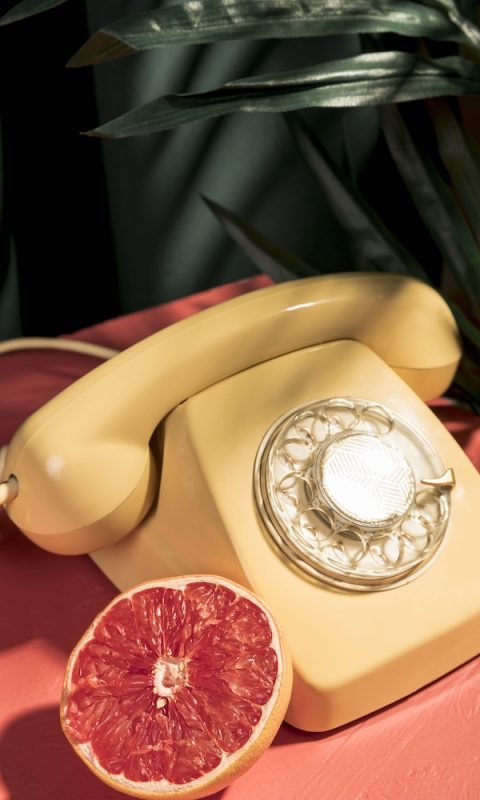 close-up-vintage-yellow-telephone